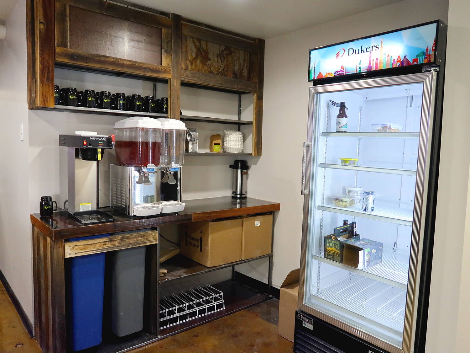 kitchen with refrigerator and drinks 